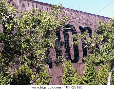 Abrau Durso, Novorossiysk, Russia - May 15, 2017: The inscription on the wall from empty bottles 