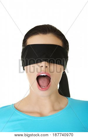 Confused blindfolded woman