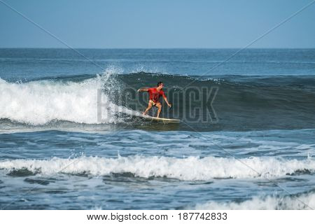 Man surfs in the ocean