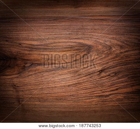Rich chocolate-brown nutwood. Walnut wooden texture. Natural funiture material.