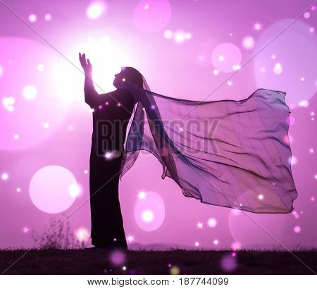  Copy space of silhouette woman rising hands on sunset sky double exposure colorful bokeh and bird fly background. Vintage tone filter effect color style.