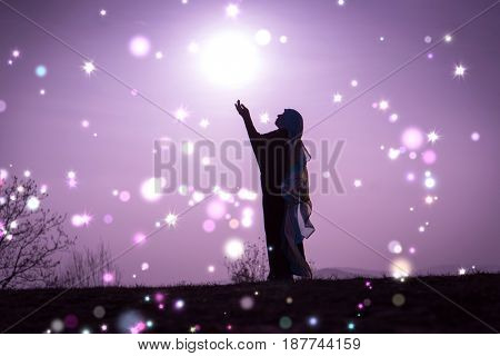  Copy space of silhouette woman rising hands on sunset sky double exposure colorful bokeh and bird fly background. Vintage tone filter effect color style.