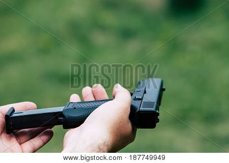 Recharge the gun in hand. Training on shooting.