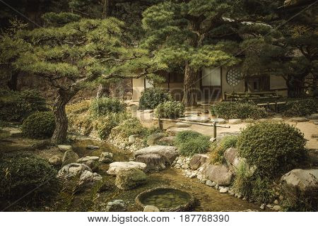 Japanese garden at sunset in Ritsurin Park, Takamatsu, Japan