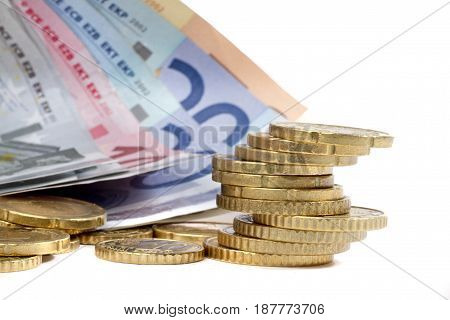 money euro coints and banknotes on white background