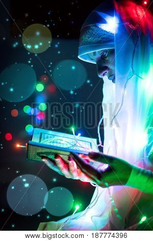 Muslim woman hands up for prying,  colorful  and  vintage tone filter effect color style.