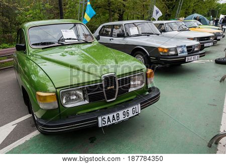 MOSCOW, RUSSIA - May 21, 2017. Retro car show exhibion in Sokolniki park. Saab 96 GL and entire line up of SAAB