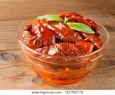 Italian Appetizer - Sundried Tomato In Bowl On The Wooden Table