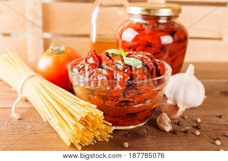 Italian Spaghetti With Ingredients For Cooking Pasta On A Wooden Table