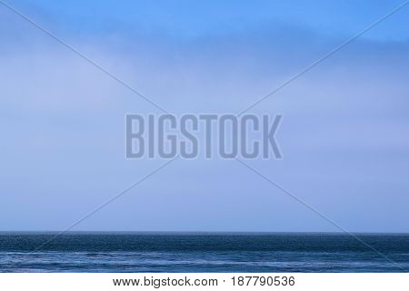 Blanket of low laying stratus clouds known as the Marine Layer taken over the Pacific Ocean off the California Coast
