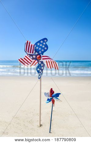 Patriotic USA background with decorations on the sandy beach