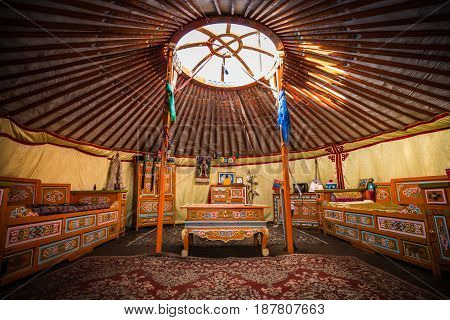 Traditional colorful yurta interior from the nomadic people in Kalmykia, Russia