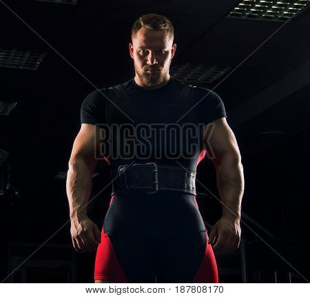 Handsome Athlete Is Standing With A Sports Belt
