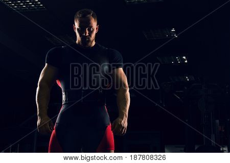Handsome Athlete Is Standing With A Sports Belt