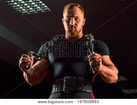 Huge Weightlifter With A Chain Around His Neck