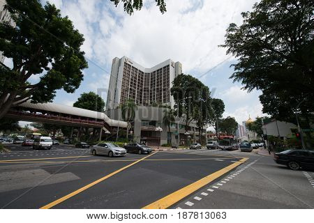 Ordinary street in Singapore. In the end of the street we can see Sultan Mosque. MARCH 2017.