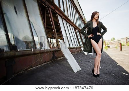 Sexy Model Girl Wit Long Legs At Black Lingerie Outfit Body Swimsuit Combidress And Jacket Posed At