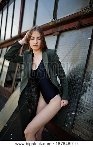 Sexy Model Girl Wit Long Legs At Black Lingerie Outfit Body Swimsuit Combidress And Jacket Posed At