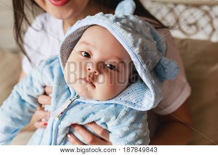 Portrait of a little adorable newborn infant asian baby.