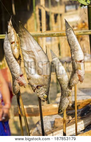 This smoked dish of fish is very popular in Assam and Northeastern part of India. The photograph was clicked in Chandubi Festival.