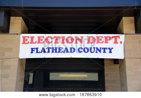 KALISPELL, MONTANA, USA - May 23, 2017: Banner hangs above the doorway of the Flathead County Election Department to advertise the department'??s location during election season.