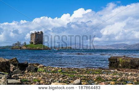 View of the Castle Stalker surrounded by water near Port Appin, Argyll, Scotland