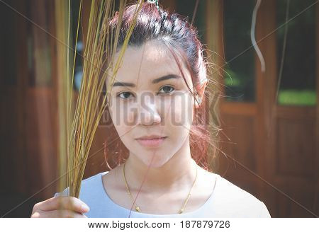 Close-up portrait of confident flirting woman with sexy look in camera