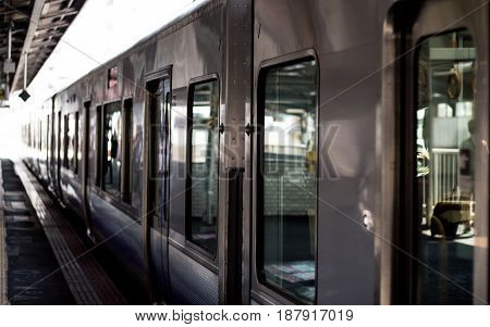Japan Rail train pulling into station at Tokyo, Japan