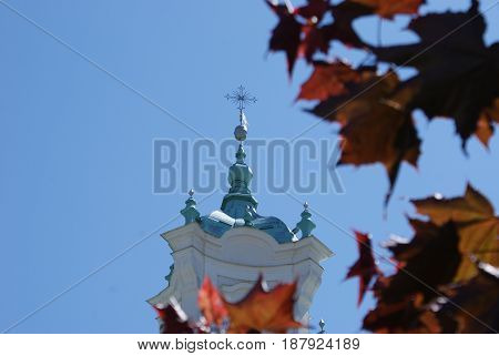Church spire in the fall in Minsk