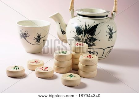 Teapot and Cup with Chinese Chess Pieces