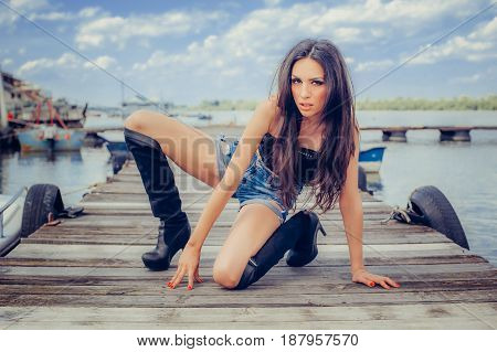 Hot Fashion Stylish Woman Posing In Sexy High Black Boots