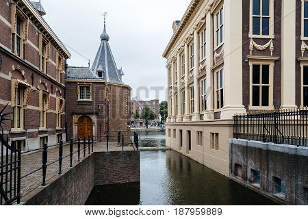Hague Netherlands - August 7 2016: Hofvijver Court Pond artificial lake beside the Binnenhof. Binnenhof is a complex of buildings in the city centre of The Hague. Office of the Prime Minister and House of Representatives.