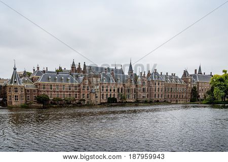 Hague Netherlands - August 7 2016: Hofvijver Court Pond artificial lake beside the Binnenhof. Binnenhof is a complex of buildings in the city centre of The Hague. Office of the Prime Minister and House of Representatives.