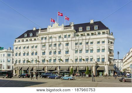 Flags on the facade of the Hotel D´angleterre in Copenhagen Denmark - May 18 2017