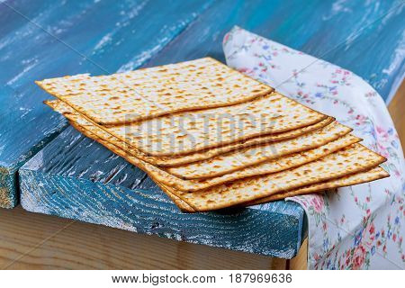 Jewish Holiday Passover Background With Matzoh On Vintage Old Wood Board.