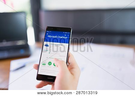 Chiang Mai, Thailand - May 06,2018: Man Holding Huawei With Onedrive On Screen. Microsoft Onedrive I