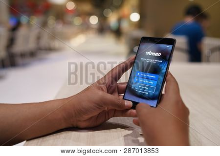 Chiang Mai, Thailand - April 4,2018: Man Holding Huawei With Vimeo On Screen.  Vimeo Is A Video-shar