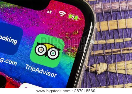 Helsinki, Finland, February 17, 2019: Tripadvisor Application Icon On Apple Iphone X Screen Close-up