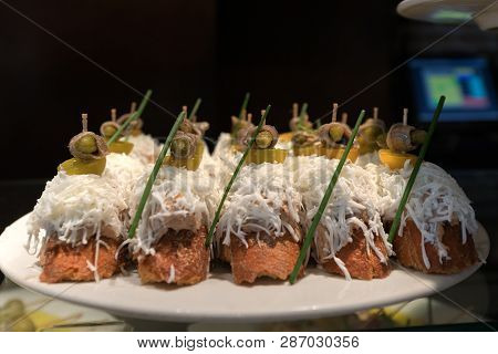 Close-up Of A Dish Of Tapas Food. Typical Small Spanish Appetizers. Barcelona, Catalonia, Spain
