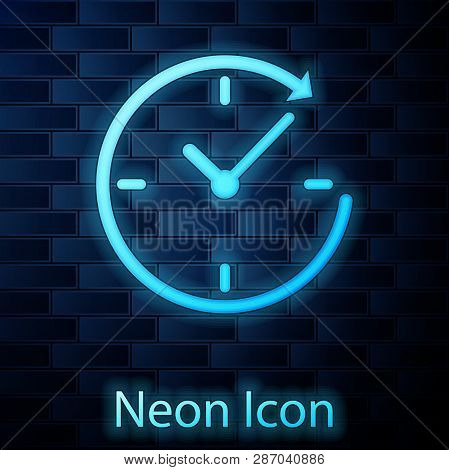 Glowing Neon Clock With Arrow Icon Isolated On Brick Wall Background. Time Symbol. Clockwise Rotatio