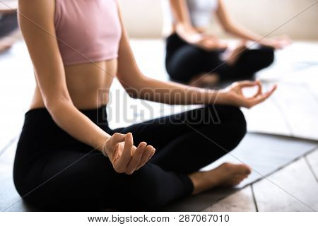 Woman And A Group Of People In Easy Seat Pose