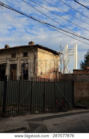 Bucharest, Romania - December 11, 2016: An Abandoned House Is Seen In Front Of 
