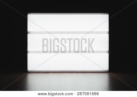Mock Up Lightbox Luminous Display Without Letters On The Table In The Dark. Place For Text Or Your D