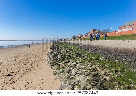 Wilhelmshaven, Germany - February 24, 2019: Beach And Dike At The Sudstrand In Wilhelmshaven, German