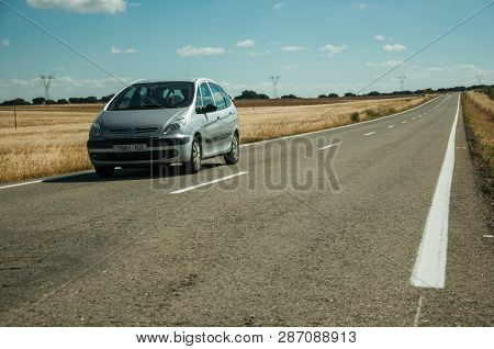 Road Through Rural Landscape And Car Near The Monfrague National Park