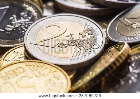 Close-up A Pile Of New Euro Coins In Other Compositions