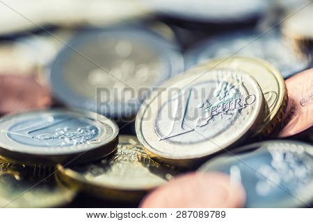 Close-up A Pile Of New Euro Coins In Other Compositions