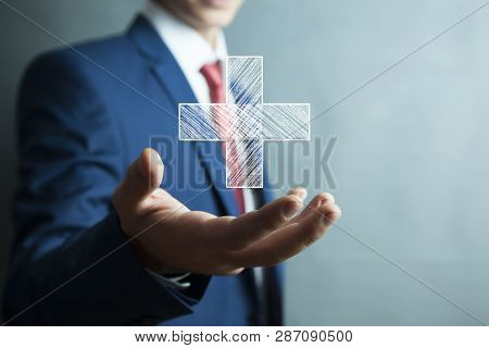 Man Touching Plus Or Cross Sign In Screen