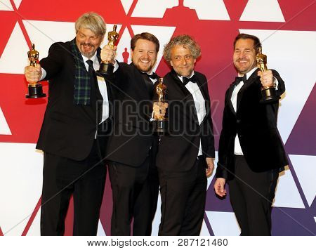 Ian Hunter, J.D. Schwalm, Paul Lambert and Tristan Myles at the 91st Annual Academy Awards - Press Room held at the Loews Hotel in Hollywood, USA on February 24, 2019.