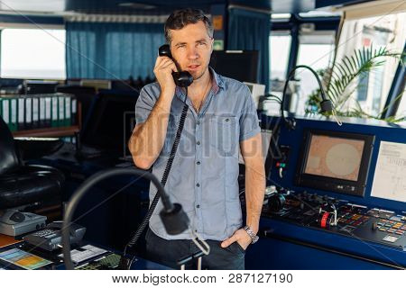 Navigational Officer Is Reporting By Vhf Radio At Sea